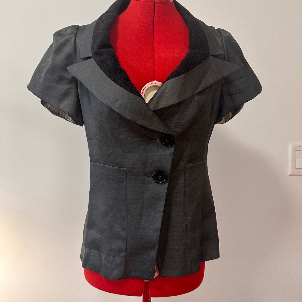 Blue Deep, grey top with an interesting collar